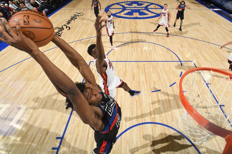 DETROIT, MI - MARCH 15: James Wiseman #13 of the Detroit Pistons dunks the ball during the game against the Miami Heat on March 15, 2024 at Little Caesars Arena in Detroit, Michigan. NOTE TO USER: User expressly acknowledges and agrees that, by downloading and/or using this photograph, User is consenting to the terms and conditions of the Getty Images License Agreement. Mandatory Copyright Notice: Copyright 2024 NBAE (Photo by Chris Schwegler/NBAE via Getty Images)