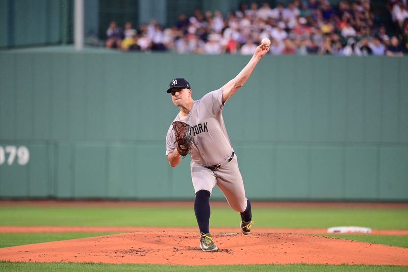 Jul 28, 2024; Boston, Massachusetts, USA; New York Yankees starting pitcher Carlos Rodon (55) pitches against the Boston Red Sox during the first inning at Fenway Park. Mandatory Credit: Eric Canha-USA TODAY Sports