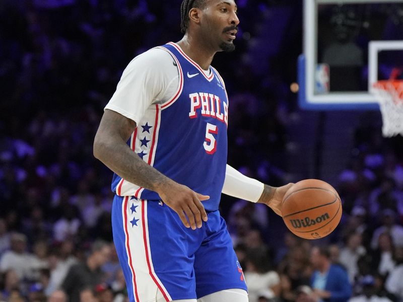 PHILADELPHIA, PA - OCTOBER 23: Andre Drummond #5 of the Philadelphia 76ers dribbles the ball during the game against the Milwaukee Bucks on October 23, 2024 at the Wells Fargo Center in Philadelphia, Pennsylvania NOTE TO USER: User expressly acknowledges and agrees that, by downloading and/or using this Photograph, user is consenting to the terms and conditions of the Getty Images License Agreement. Mandatory Copyright Notice: Copyright 2024 NBAE (Photo by Jesse D. Garrabrant/NBAE via Getty Images)