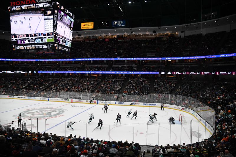 Dec 23, 2023; Anaheim, California, USA; Seattle Kraken defenseman Will Borgen (3) shoots on goal against the Anaheim Ducks during the first period at Honda Center. Mandatory Credit: Gary A. Vasquez-USA TODAY Sports