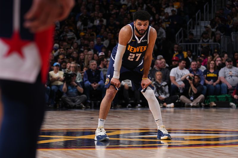 DENVER, CO - FEBRUARY 22: Jamal Murray #27 of the Denver Nuggets looks on during the game against the Washington Wizards on February 22, 2024 at the Ball Arena in Denver, Colorado. NOTE TO USER: User expressly acknowledges and agrees that, by downloading and/or using this Photograph, user is consenting to the terms and conditions of the Getty Images License Agreement. Mandatory Copyright Notice: Copyright 2024 NBAE (Photo by Bart Young/NBAE via Getty Images)