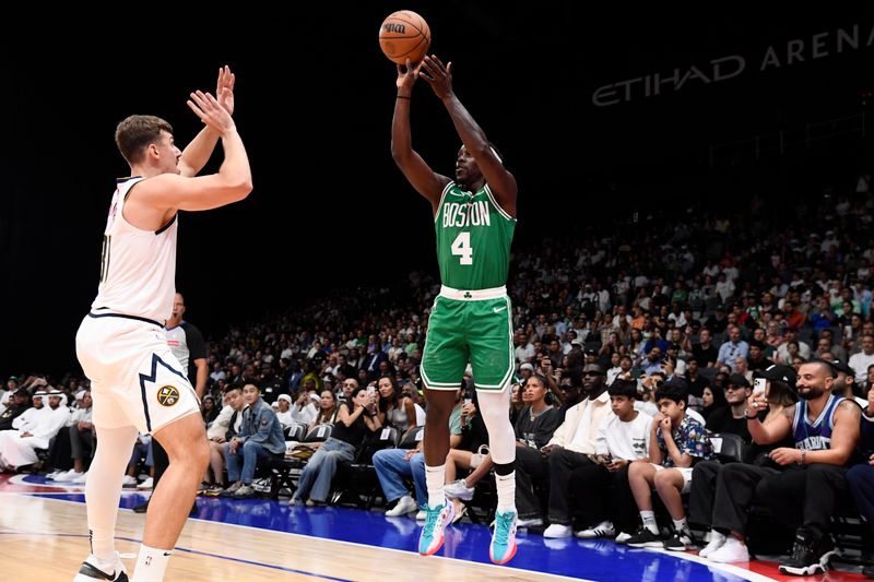 ABU DHABI, UAE - OCTOBER 6: Jrue Holiday #4 of the Boston Celtics shoots the ball during the game against the Denver Nuggets during the 2024 Global Games on October 6, 2024 at the Etihad Arena in Abu Dhabi, United Arab Emirates. NOTE TO USER: User expressly acknowledges and agrees that, by downloading and/or using this Photograph, user is consenting to the terms and conditions of the Getty Images License Agreement. Mandatory Copyright Notice: Copyright 2024 NBAE (Photo by Brian Babineau/NBAE via Getty Images)