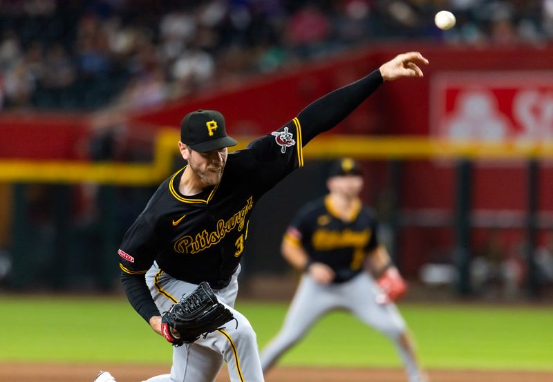May 27, 2025; Phoenix, Arizona, USA; Pittsburgh Pirates pitcher Joey Wentz in the eighth inning against the Arizona Diamondbacks at Chase Field. Mandatory Credit: Mark J. Rebilas-Imagn Images