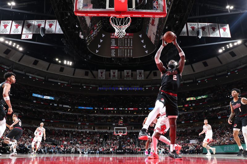 CHICAGO, IL - MARCH 18:  Deandre Ayton #2 of the Portland Trail Blazers grabs a rebound during the game against the Chicago Bulls on March 18, 2024 at United Center in Chicago, Illinois. NOTE TO USER: User expressly acknowledges and agrees that, by downloading and or using this photograph, User is consenting to the terms and conditions of the Getty Images License Agreement. Mandatory Copyright Notice: Copyright 2024 NBAE (Photo by Jeff Haynes/NBAE via Getty Images)