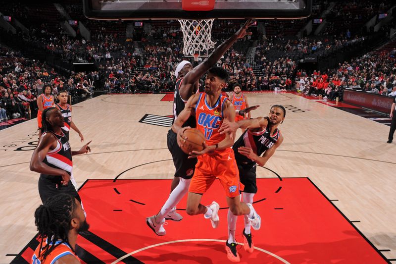 PORTLAND, OR - NOVEMBER 1: Malevy Leons #17 of the Oklahoma City Thunder drives to the basket during the game against the Portland Trail Blazers on November 1, 2024 at the Moda Center Arena in Portland, Oregon. NOTE TO USER: User expressly acknowledges and agrees that, by downloading and or using this photograph, user is consenting to the terms and conditions of the Getty Images License Agreement. Mandatory Copyright Notice: Copyright 2024 NBAE (Photo by Cameron Browne/NBAE via Getty Images)