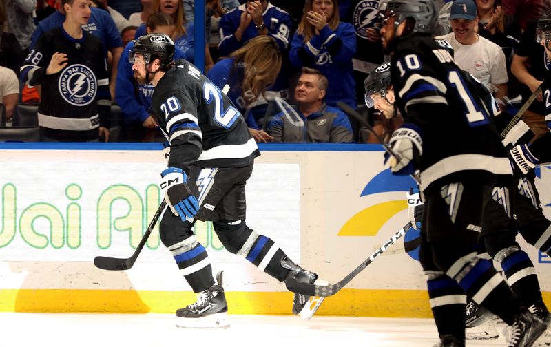 Mar 9, 2024; Tampa, Florida, USA; Tampa Bay Lightning left wing Nicholas Paul (20) celebrates after scoring a goal against the Philadelphia Flyers during the first period at Amalie Arena. Mandatory Credit: Kim Klement Neitzel-USA TODAY Sports