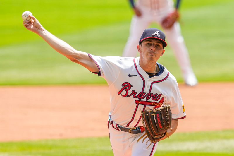 Apr 11, 2024; Cumberland, Georgia, USA; Atlanta Braves starting pitcher Allan Winans (72) pitches against the New York Mets during the first inning at Truist Park. Mandatory Credit: Dale Zanine-USA TODAY Sports