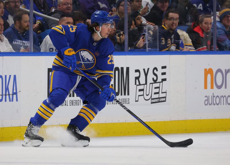 Dec 21, 2023; Buffalo, New York, USA;  Buffalo Sabres defenseman Owen Power (25) looks to make a pass during the first period against the Toronto Maple Leafs at KeyBank Center. Mandatory Credit: Timothy T. Ludwig-USA TODAY Sports