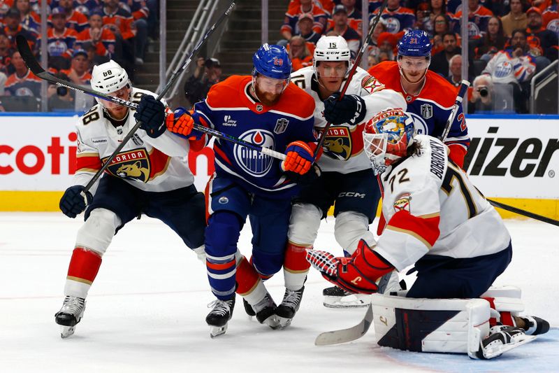 Jun 4, 2025; Edmonton, Alberta, CAN; Edmonton Oilers right wing Connor Brown (28) attempts to shoot on Florida Panthers goaltender Sergei Bobrovsky (72) in the third period in game one of the 2025 Stanley Cup Final at Rogers Place. Mandatory Credit: Perry Nelson-Imagn Images