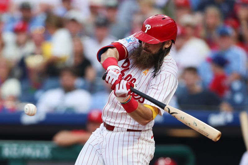 Sep 13, 2025; Philadelphia, Pennsylvania, USA; Philadelphia Phillies outfielder Brandon Marsh (16) hits a two RBI double against the Kansas City Royals during the first inning at Citizens Bank Park. Mandatory Credit: Bill Streicher-Imagn Images