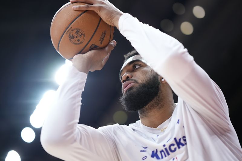 TORONTO, CANADA - DECEMBER 9: Karl-Anthony Towns #32 of the New York Knicks warms up before the game against the Toronto Raptors on December 9, 2024 at the Scotiabank Arena in Toronto, Ontario, Canada.  NOTE TO USER: User expressly acknowledges and agrees that, by downloading and or using this Photograph, user is consenting to the terms and conditions of the Getty Images License Agreement.  Mandatory Copyright Notice: Copyright 2024 NBAE (Photo by Mark Blinch/NBAE via Getty Images)