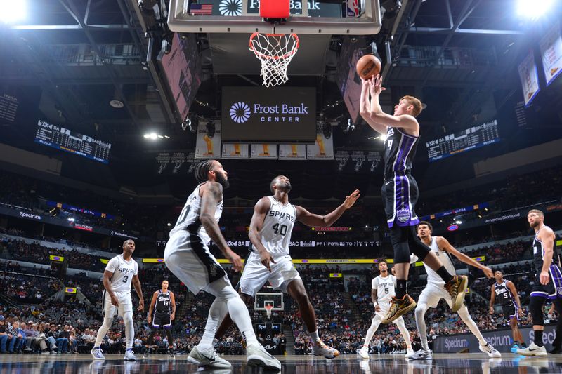 SAN ANTONIO, TX - NOVEMBER 11:  Kevin Huerter #9 of the Sacramento Kings shoots the ball during the game against the San Antonio Spurs during a regular season game on November 11, 2024 at the Frost Bank Center in San Antonio, Texas. NOTE TO USER: User expressly acknowledges and agrees that, by downloading and or using this photograph, user is consenting to the terms and conditions of the Getty Images License Agreement. Mandatory Copyright Notice: Copyright 2024 NBAE (Photos by Michael Gonzales/NBAE via Getty Images)