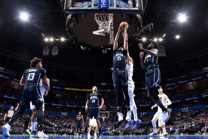 ORLANDO, FL - JANUARY 5 :  Goga Bitadze #35 of the Orlando Magic dunks the ball during the game against the Utah Jazz on January 5, 2025 at Kia Center in Orlando, Florida. NOTE TO USER: User expressly acknowledges and agrees that, by downloading and or using this photograph, User is consenting to the terms and conditions of the Getty Images License Agreement. Mandatory Copyright Notice: Copyright 2025 NBAE (Photo by Fernando Medina/NBAE via Getty Images)