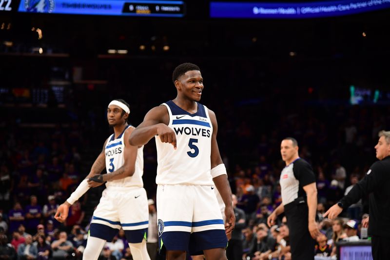 PHOENIX, AZ - APRIL  28: Anthony Edwards #5 of the Minnesota Timberwolves celebrates during the game against the Phoenix Suns during Round 1 Game 4 of the 2024 NBA Playoffs on April 28, 2024 at Footprint Center in Phoenix, Arizona. NOTE TO USER: User expressly acknowledges and agrees that, by downloading and or using this photograph, user is consenting to the terms and conditions of the Getty Images License Agreement. Mandatory Copyright Notice: Copyright 2024 NBAE (Photo by Kate Frese/NBAE via Getty Images)