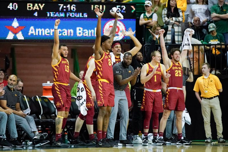 Mar 4, 2023; Waco, Texas, USA; The Iowa State Cyclone bench reacts after a basket against the Baylor Bears during the second half at Ferrell Center. Mandatory Credit: Raymond Carlin III-USA TODAY Sports