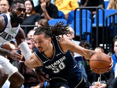 ORLANDO, FL - NOVEMBER 6: Cole Anthony #50 of the Orlando Magic drives to the basket during the game against the Dallas Mavericks on November 6, 2023 at Amway Center in Orlando, Florida. NOTE TO USER: User expressly acknowledges and agrees that, by downloading and or using this photograph, User is consenting to the terms and conditions of the Getty Images License Agreement. Mandatory Copyright Notice: Copyright 2023 NBAE (Photo by Fernando Medina/NBAE via Getty Images)