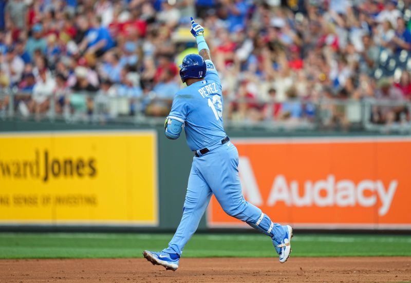 Aug 11, 2023; Kansas City, Missouri, USA; Kansas City Royals catcher Salvador Perez (13) rounds the bases after hitting a home run against the St. Louis Cardinals during the second inning at Kauffman Stadium. Mandatory Credit: Jay Biggerstaff-USA TODAY Sports