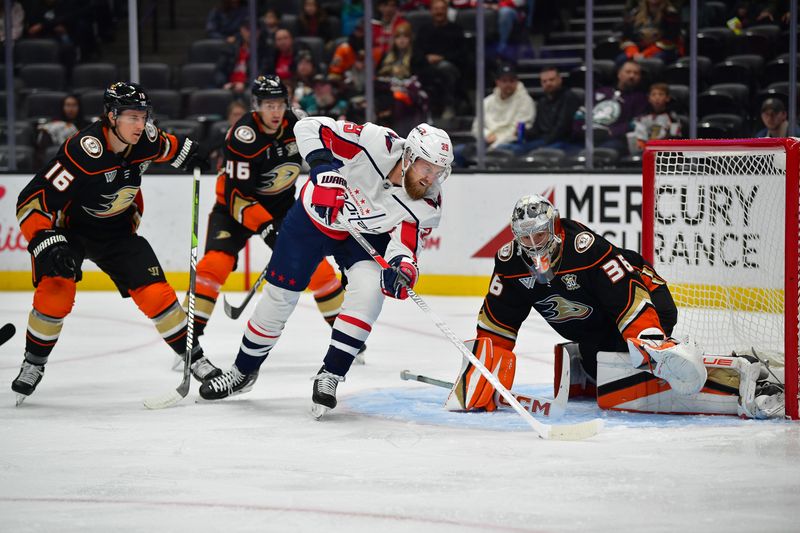 Nov 30, 2023; Anaheim, California, USA; Washington Capitals right wing Anthony Mantha (39) moves in to score a goal against Anaheim Ducks goaltender John Gibson (36) during the first period at Honda Center. Mandatory Credit: Gary A. Vasquez-USA TODAY Sports