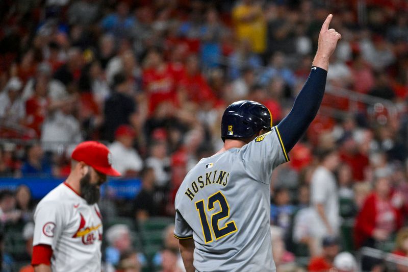 Aug 21, 2024; St. Louis, Missouri, USA;  Milwaukee Brewers first baseman Rhys Hoskins (12) reacts after scoring on a two run double off of St. Louis Cardinals relief pitcher Andrew Kittredge (27) during the eighth inning at Busch Stadium. Mandatory Credit: Jeff Curry-USA TODAY Sports