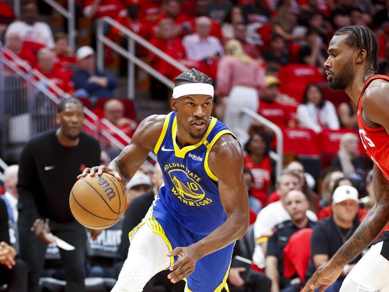 HOUSTON, TX - APRIL 20: Jimmy Butler #10 of the Golden State Warriors drives to the basket during the game against the Houston Rockets during Round One Game One of the 2025 NBA Playoffs on April 20, 2025 at the Toyota Center in Houston, Texas. NOTE TO USER: User expressly acknowledges and agrees that, by downloading and or using this photograph, User is consenting to the terms and conditions of the Getty Images License Agreement. Mandatory Copyright Notice: Copyright 2025 NBAE (Photo by Logan Riely/NBAE via Getty Images)