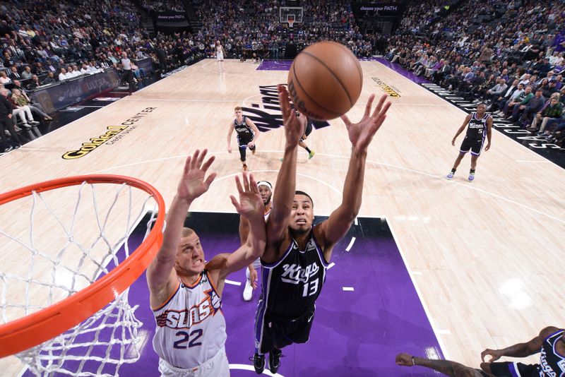 SACRAMENTO, CA - NOVEMBER 13: Keegan Murray #13 of the Sacramento Kings goes up for the rebound during the game against the Phoenix Suns on November 13, 2024 at Golden 1 Center in Sacramento, California. NOTE TO USER: User expressly acknowledges and agrees that, by downloading and or using this Photograph, user is consenting to the terms and conditions of the Getty Images License Agreement. Mandatory Copyright Notice: Copyright 2024 NBAE (Photo by Rocky Widner/NBAE via Getty Images)