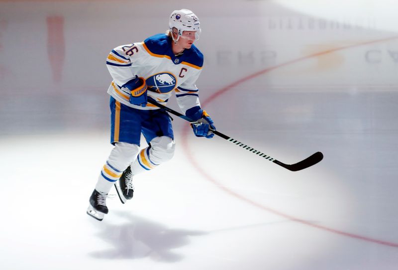 Oct 16, 2024; Pittsburgh, Pennsylvania, USA; Buffalo Sabres defenseman Rasmus Dahlin (26) warms up before the game against the Pittsburgh Penguins at PPG Paints Arena. Mandatory Credit: Charles LeClaire-Imagn Images