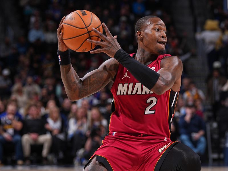 DENVER, CO - NOVEMBER 8: Terry Rozier #2 of the Miami Heat looks to pass the ball during the game against the Denver Nuggets on November 8, 2024 at Ball Arena in Denver, Colorado. NOTE TO USER: User expressly acknowledges and agrees that, by downloading and/or using this Photograph, user is consenting to the terms and conditions of the Getty Images License Agreement. Mandatory Copyright Notice: Copyright 2024 NBAE (Photo by Bart Young/NBAE via Getty Images)