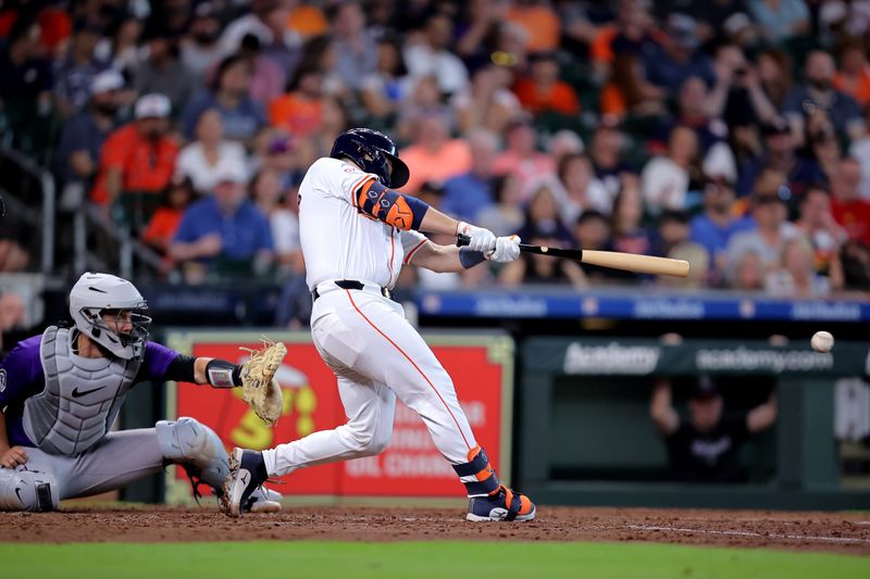 Jun 26, 2024; Houston, Texas, USA; Houston Astros catcher Cesar Salazar (18) hits a double to right field against the Colorado Rockies during the fifth inning at Minute Maid Park. Mandatory Credit: Erik Williams-USA TODAY Sports