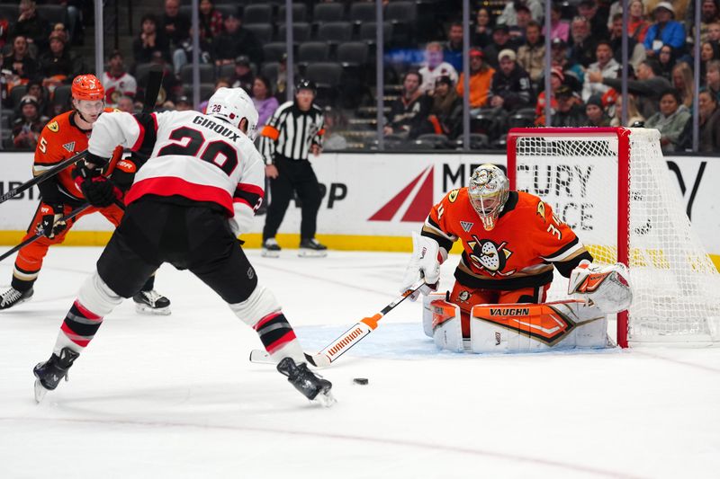 Nov 20, 2025; Anaheim, California, USA; Ottawa Senators right wing Claude Giroux (28) shoots the puck against Anaheim Ducks goaltender Petr Mrazek (34) in the first period at Honda Center. Mandatory Credit: Kirby Lee-Imagn Images