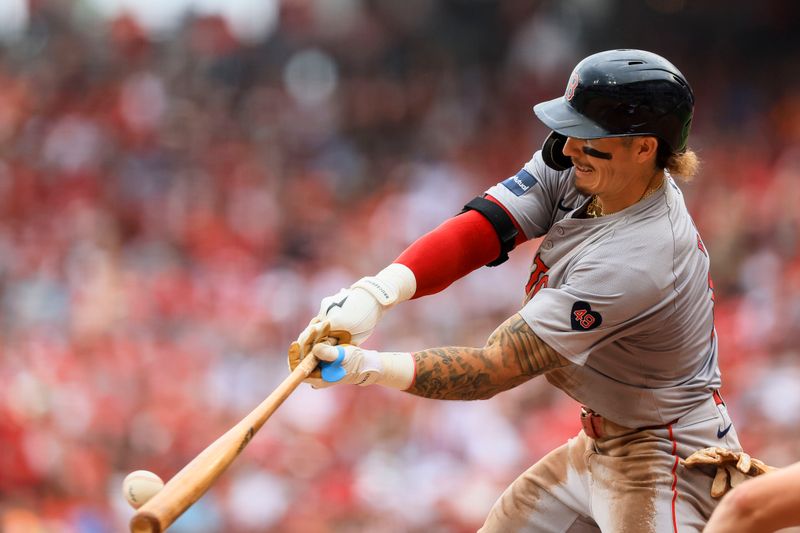 Jun 23, 2024; Cincinnati, Ohio, USA; Boston Red Sox outfielder Jarren Duran (16) hits a RBI single against the Cincinnati Reds in the sixth inning at Great American Ball Park. Mandatory Credit: Katie Stratman-USA TODAY Sports