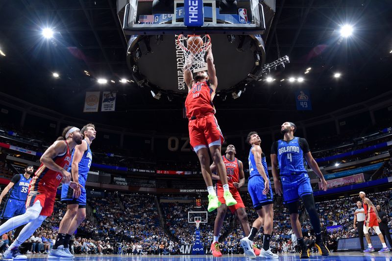 ORLANDO, FL - NOVEMBER 8: Jeremiah Robinson-Earl #50 of the New Orleans Pelicans dunks the ball during the game against the Orlando Magic on November 8, 2024 at the Kia Center in Orlando, Florida. NOTE TO USER: User expressly acknowledges and agrees that, by downloading and or using this photograph, User is consenting to the terms and conditions of the Getty Images License Agreement. Mandatory Copyright Notice: Copyright 2024 NBAE (Photo by Fernando Medina/NBAE via Getty Images)