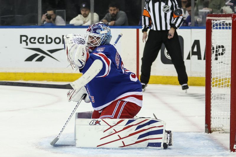 Nov 29, 2025; New York, New York, USA;  New York Rangers goaltender Igor Shesterkin (31) makes a save on a shot on goal attempt in the first period against the Tampa Bay Lightning at Madison Square Garden. Mandatory Credit: Wendell Cruz-Imagn Images