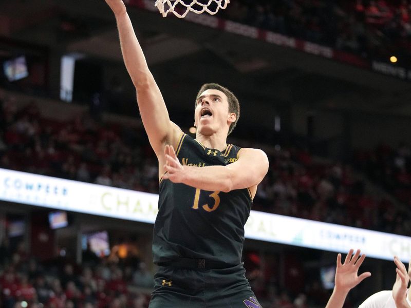 Jan 13, 2024; Madison, Wisconsin, USA; Northwestern Wildcats guard Brooks Barnhizer (13) scores against the Wisconsin Badgers during the first half at the Kohl Center. Mandatory Credit: Kayla Wolf-USA TODAY Sports