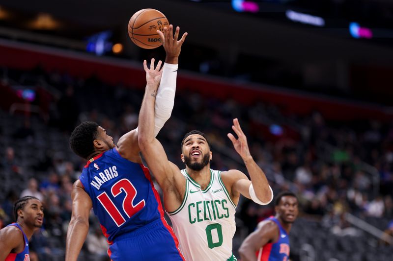 DETROIT, MICHIGAN - OCTOBER 26: Jayson Tatum #0 of the Boston Celtics shoots the ball as he is fouled by Tobias Harris #12 of the Detroit Pistons in the first quarter of a game at Little Caesars Arena on October 26, 2024 in Detroit, Michigan. NOTE TO USER: User expressly acknowledges and agrees that, by downloading and or using this photograph, User is consenting to the terms and conditions of the Getty Images License Agreement. (Photo by Mike Mulholland/Getty Images)