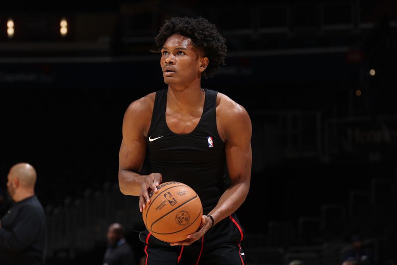 WASHINGTON, DC -? MARCH 19: Amen Thompson #1 of the Houston Rockets warms up before the game against the Washington Wizards on March 19, 2024 at Capital One Arena in Washington, DC. NOTE TO USER: User expressly acknowledges and agrees that, by downloading and or using this Photograph, user is consenting to the terms and conditions of the Getty Images License Agreement. Mandatory Copyright Notice: Copyright 2024 NBAE (Photo by Stephen Gosling/NBAE via Getty Images)