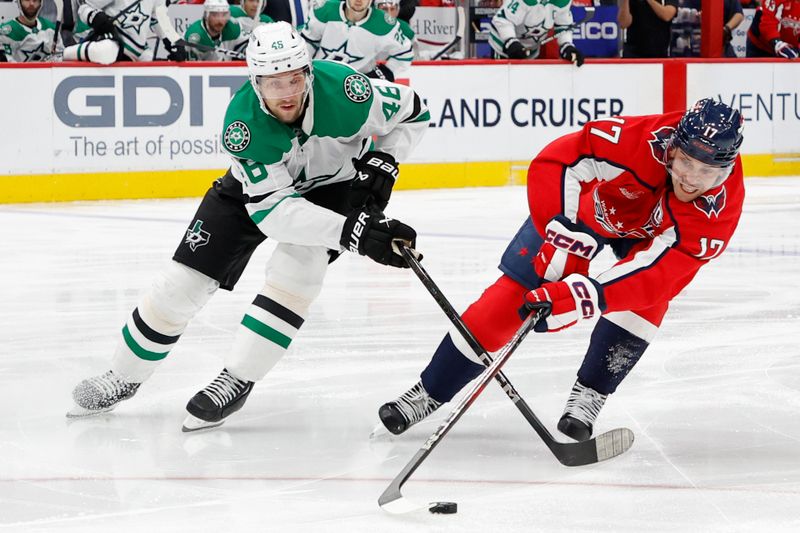 Oct 17, 2024; Washington, District of Columbia, USA; Washington Capitals center Dylan Strome (17) and Dallas Stars defenseman Ilya Lyubushkin (46) in the third period at Capital One Arena. Mandatory Credit: Geoff Burke-Imagn Images