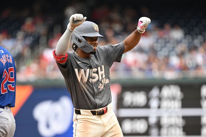 Aug 31, 2024; Washington, District of Columbia, USA; Washington Nationals third baseman Jose Tena (8) reacts after getting a base hit against the Chicago Cubs during the fourth inning at Nationals Park. Mandatory Credit: Rafael Suanes-USA TODAY Sports