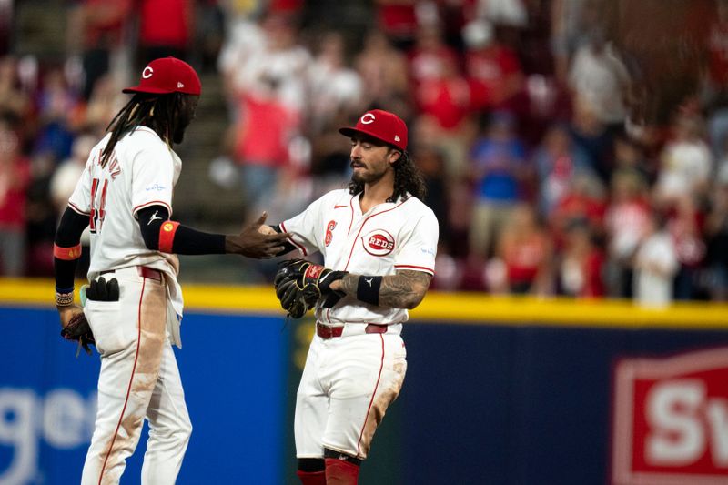 Aug 3, 2024; Cincinnati, Ohio, USA; Cincinnati Reds shortstop Elly De La Cruz (44) and second baseman Jonathan India (6) celebrate after defeating the San Francisco Giants at Great American Ball Park. Mandatory Credit: Albert Cesare-USA TODAY Sports