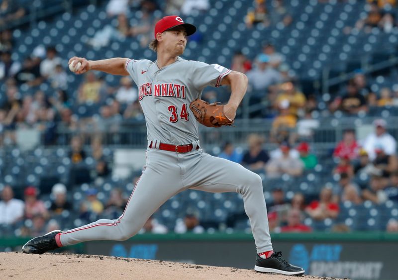 Aug 13, 2023; Pittsburgh, PA, USA; Cincinnati Reds starting pitcher Luke Weaver (34) delivers a pitch against the Pittsburgh Pirates during the first inning at PNC Park. Mandatory Credit: Charles LeClaire-USA TODAY Sports