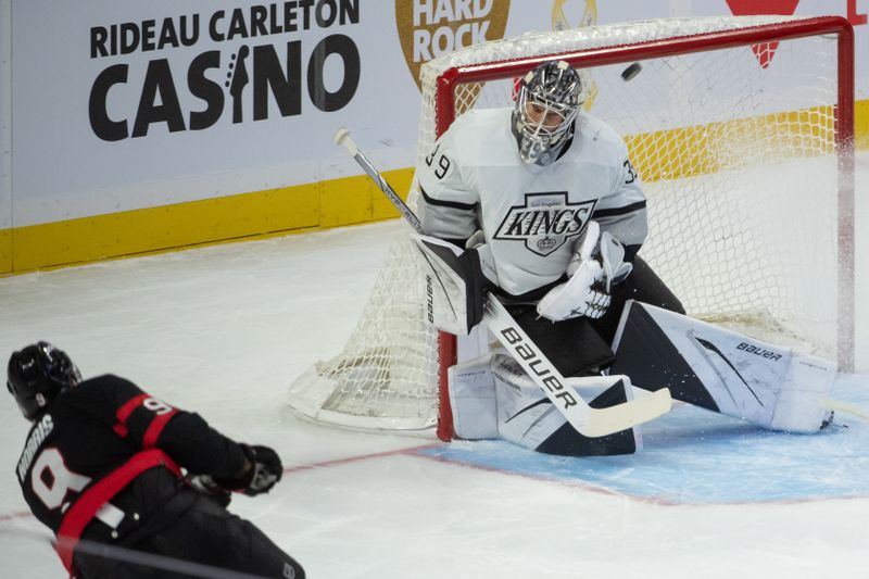 Nov 2, 2023; Ottawa, Ontario, CAN; Los Angeles Kings goalie Cam Talbot (39) makes a save on a shot from Ottawa Senators center Josh Norris (9) in the third period at the Canadian Tire Centre. Mandatory Credit: Marc DesRosiers-USA TODAY Sports