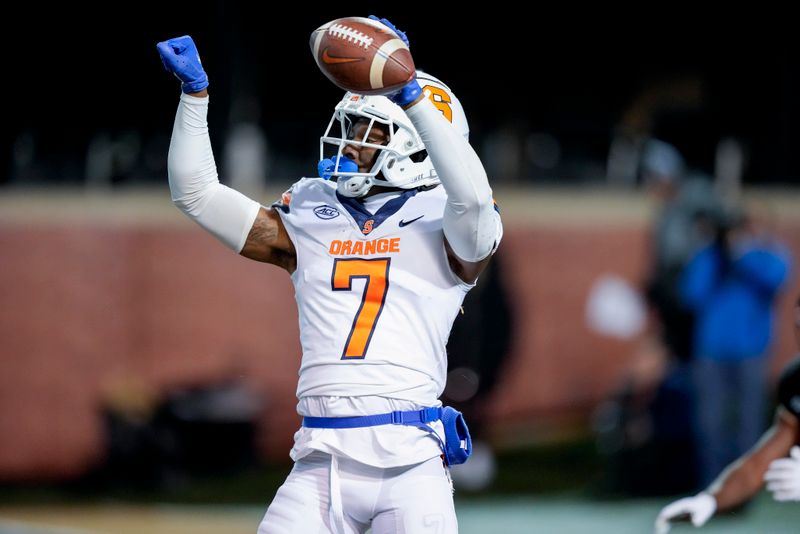 Nov 19, 2022; Winston-Salem, North Carolina, USA;  Syracuse Orange wide receiver Devaughn Cooper (7) celebrates after scoring a touchdown against the Wake Forest Demon Deacons during the first half at Truist Field. Mandatory Credit: Jim Dedmon-USA TODAY Sports