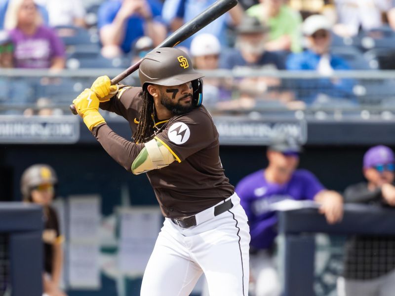 Mar 5, 2025; Peoria, Arizona, USA; San Diego Padres outfielder Fernando Tatis Jr. against the Colorado Rockies during a spring training game at Peoria Sports Complex. Mandatory Credit: Mark J. Rebilas-Imagn Images