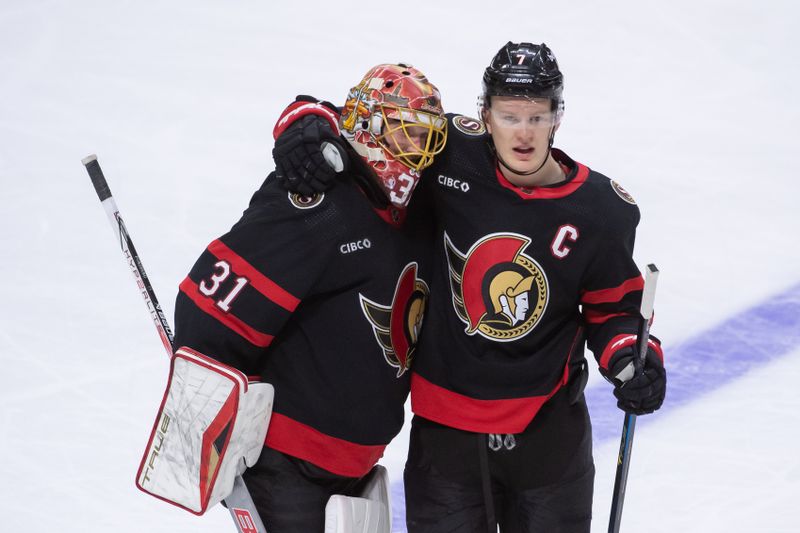 Dec 23, 2023; Ottawa, Ontario, CAN; Ottawa Senators goalie Anton Forsberg (31) celebrates with left wing Brady Tkachuk (7) their win in overtime against the Pittsburgh Penguins at at the Canadian Tire Centre. Mandatory Credit: Marc DesRosiers-USA TODAY Sports