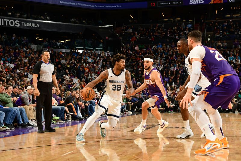 PHOENIX, AZ - JANUARY  7: Marcus Smart #36 of the Memphis Grizzlies dribbles the ball during the game against the Phoenix Suns on January 7, 2024 at Footprint Center in Phoenix, Arizona. NOTE TO USER: User expressly acknowledges and agrees that, by downloading and or using this photograph, user is consenting to the terms and conditions of the Getty Images License Agreement. Mandatory Copyright Notice: Copyright 2024 NBAE (Photo by Kate Frese/NBAE via Getty Images)