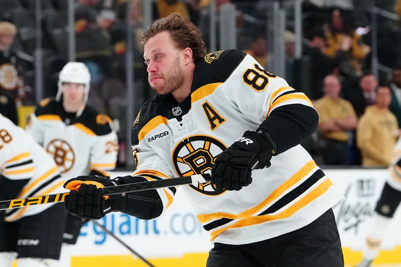 Mar 20, 2025; Las Vegas, Nevada, USA; Boston Bruins right wing David Pastrnak (88) warms up before a game against the Vegas Golden Knights at T-Mobile Arena. Mandatory Credit: Stephen R. Sylvanie-Imagn Images