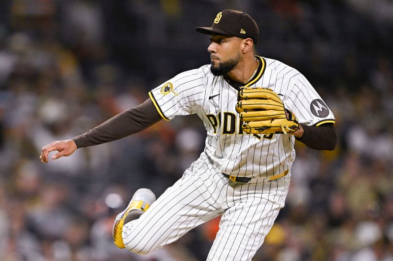 Apr 29, 2025; San Diego, California, USA; San Diego Padres pitcher Robert Suarez (75) delivers during the ninth inning against the San Francisco Giants at Petco Park. Mandatory Credit: Denis Poroy-Imagn Images