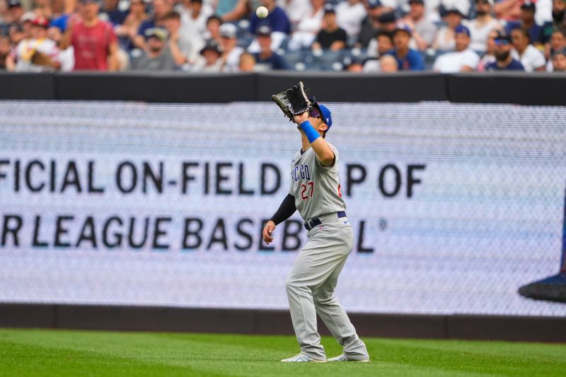 Jul 8, 2023; Bronx, New York, USA; Chicago Cubs right fielder Seiya Suzuki (27) catches a fly ball during the sixth inning at Yankee Stadium. Mandatory Credit: Gregory Fisher-USA TODAY Sports