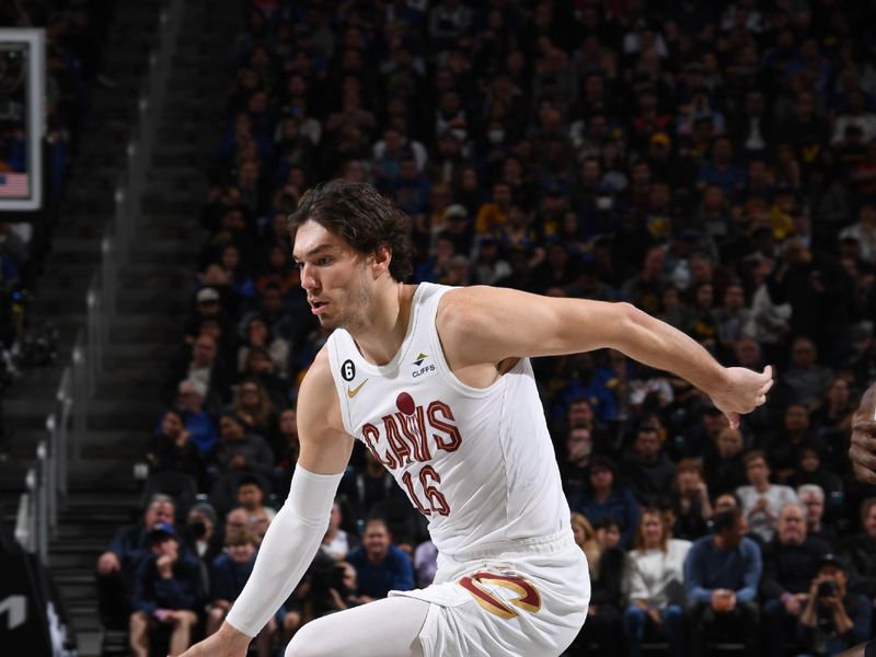 SAN FRANCISCO, CA - NOVEMBER 11: Cedi Osman #16 of the Cleveland Cavaliers drives to the basket during the game against the Golden State Warriors on November 11, 2022 at Chase Center in San Francisco, California. NOTE TO USER: User expressly acknowledges and agrees that, by downloading and or using this photograph, user is consenting to the terms and conditions of Getty Images License Agreement. Mandatory Copyright Notice: Copyright 2022 NBAE (Photo by Noah Graham/NBAE via Getty Images)