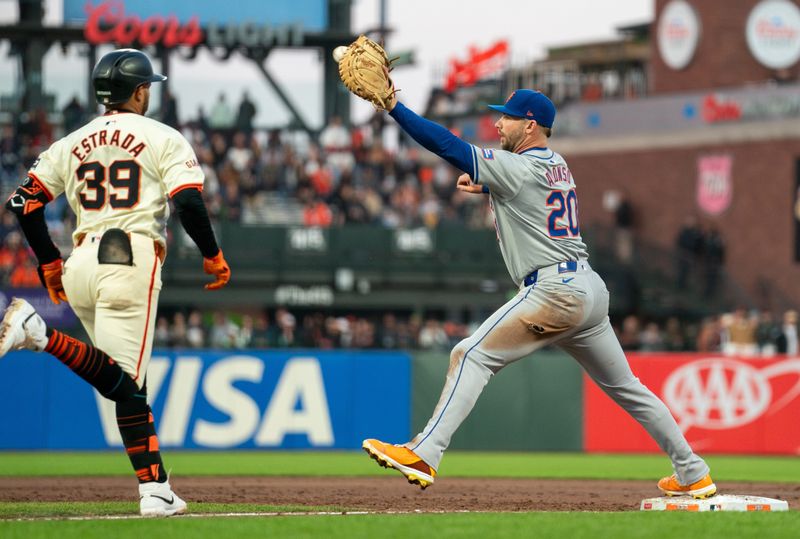 Apr 22, 2024; San Francisco, California, USA;  San Francisco Giants second baseman Thairo Estrada (39) is forced out by New York Mets first base Pete Alonso (20) during end the third inning at Oracle Park. Mandatory Credit: Neville E. Guard-USA TODAY Sports