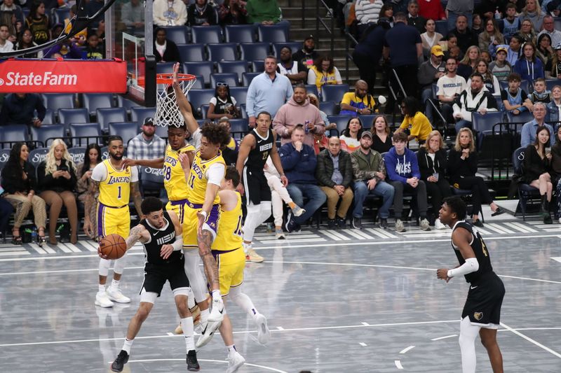 MEMPHIS, TN - MARCH 27: Shaquille Harrison #1 of the Memphis Grizzlies passes the ball during the game against the Los Angeles Lakers on March 27, 2024 at FedExForum in Memphis, Tennessee. NOTE TO USER: User expressly acknowledges and agrees that, by downloading and or using this photograph, User is consenting to the terms and conditions of the Getty Images License Agreement. Mandatory Copyright Notice: Copyright 2024 NBAE (Photo by Joe Murphy/NBAE via Getty Images)